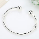 Sterling Silver Bangle Bracelet with Spacer Stoppers and Smooth Ball Ends